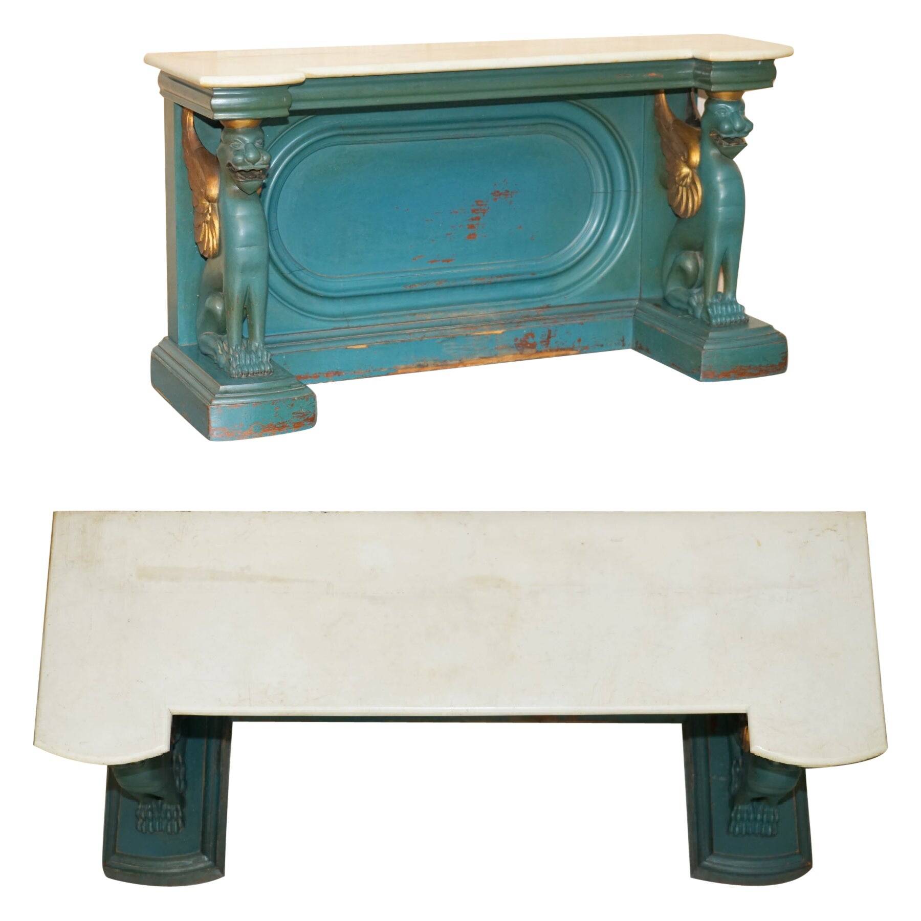 Antique hand-carved console circa 1880 with a marble top.