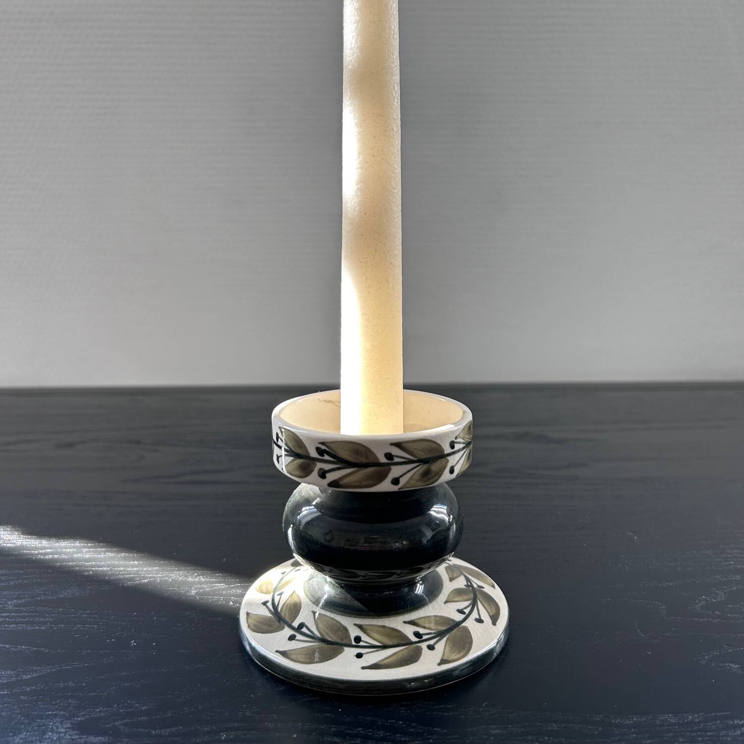 Scandinavian candle holder with plant decoration