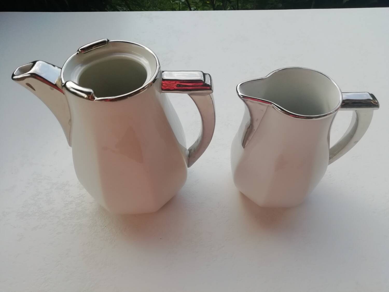 Pair of milk jug teapots