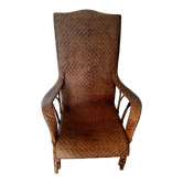 Fauteuil en rotin tressé ancien