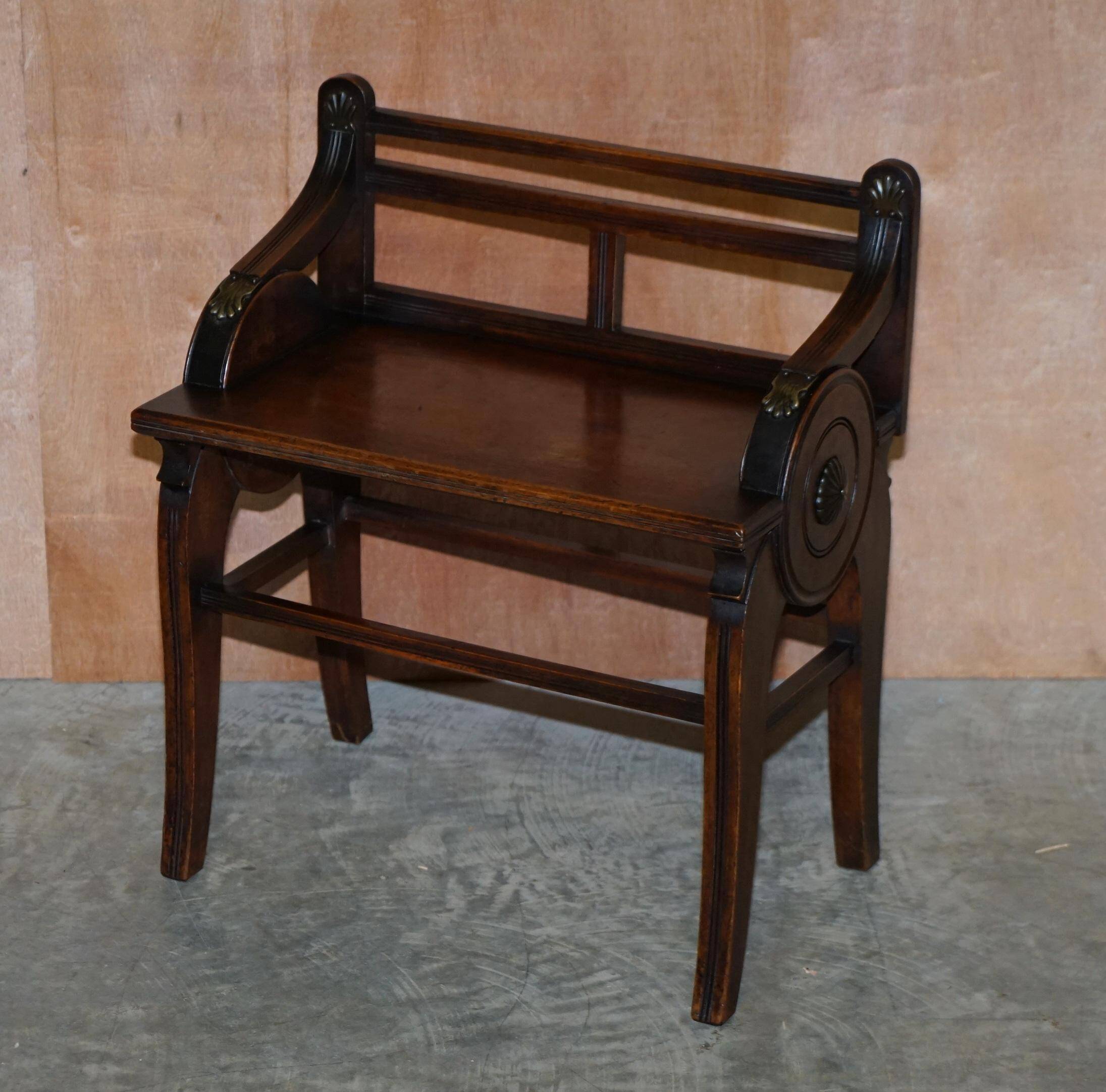 Antique entrance bench by Jas Shoolbred with brass fittings and walnut frame circa 1890.