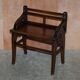 Antique entrance bench by Jas Shoolbred with brass fittings and walnut frame circa 1890.