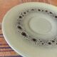 A pair of vintage cups and saucers in glazed stoneware.