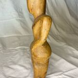 Wooden woman sculpture
