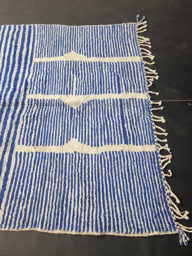 Handwoven Berber rug in blue and white, size 150x250 cm.