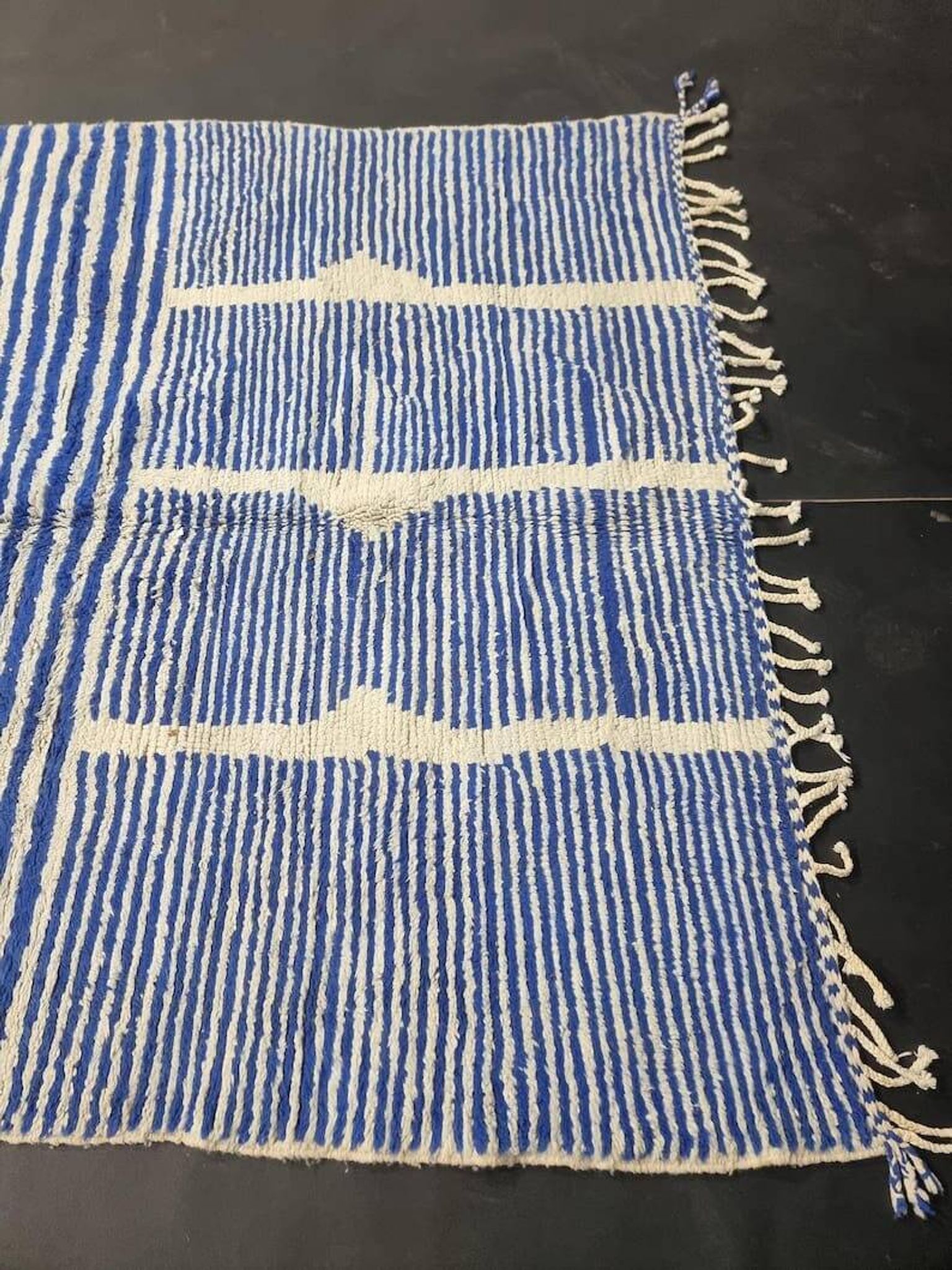 Handwoven Berber rug in blue and white, size 150x250 cm.