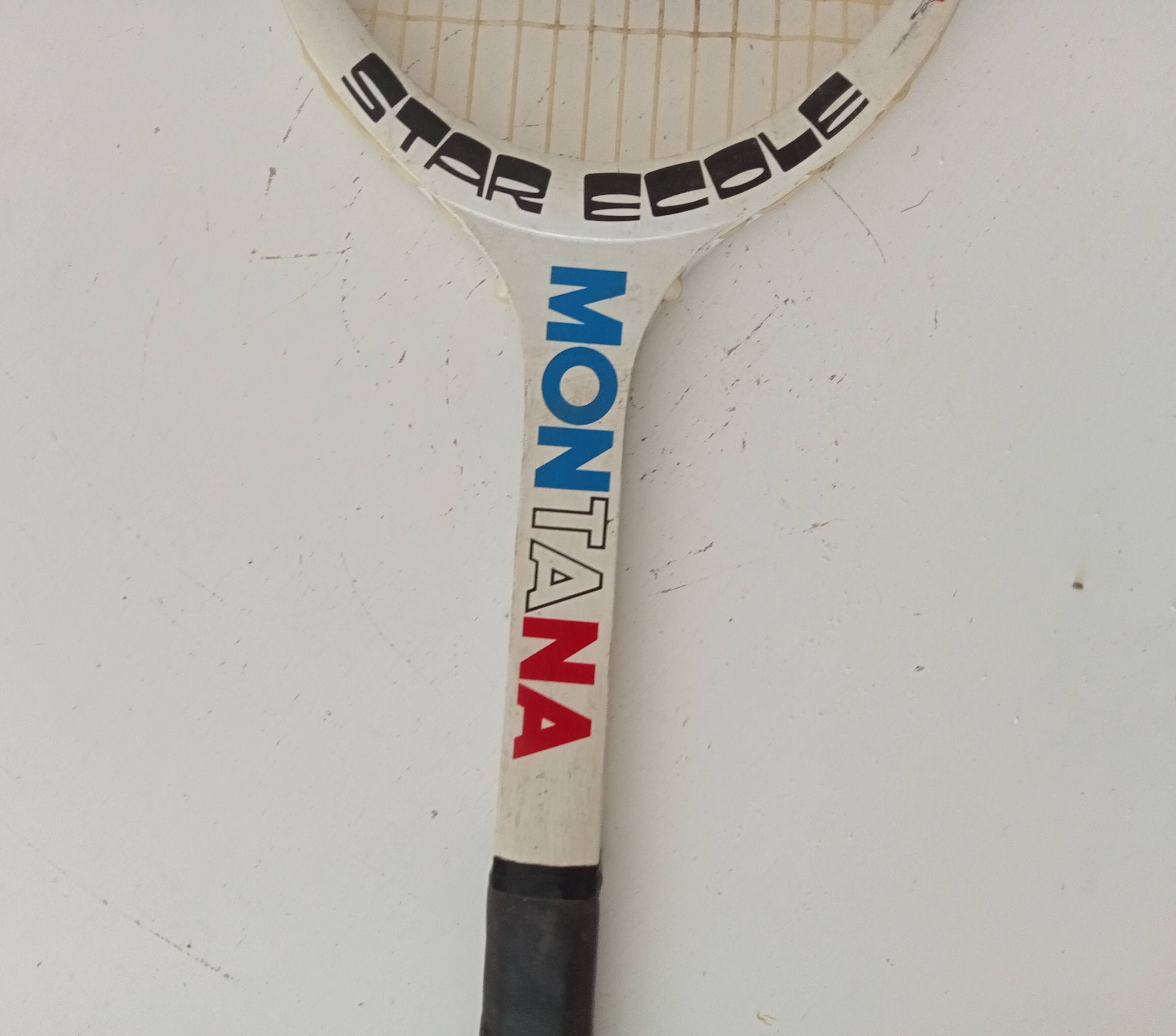 Vintage wooden tennis racket Montana