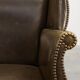 Mid-century Wing Back Armchair in green leather, UK