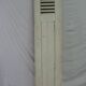 Old shutter in folding wooden louver
