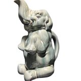 Ceramic jug in the shape of an elephant.