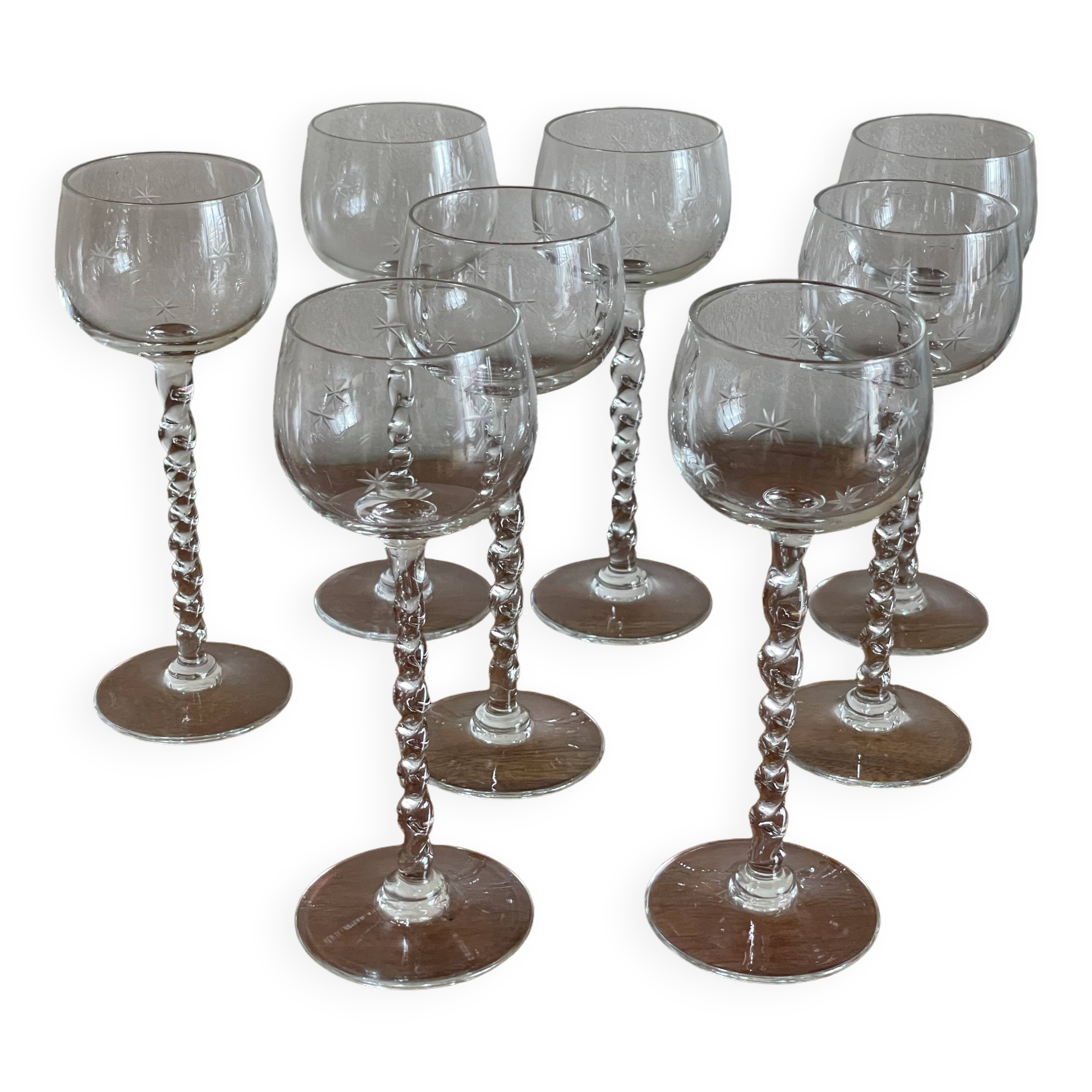 8 glasses with twisted stem and star pattern