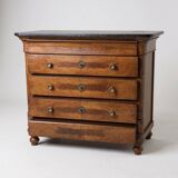 Chest of drawers in walnut and walnut veneer with black veined marble top