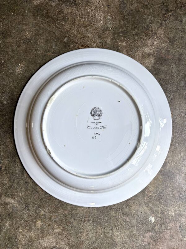 Grand plat rond creux Christian Dior en faïence italienne