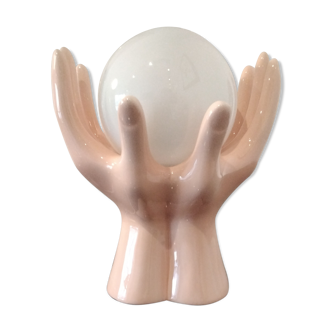 Lamp in the shape of a globe hand