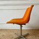 Chrome metal chair with orange fabric from the 70s.