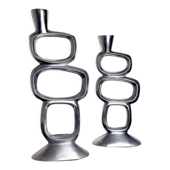 Pair of circle candlesticks by matthew hilton, england, 1980