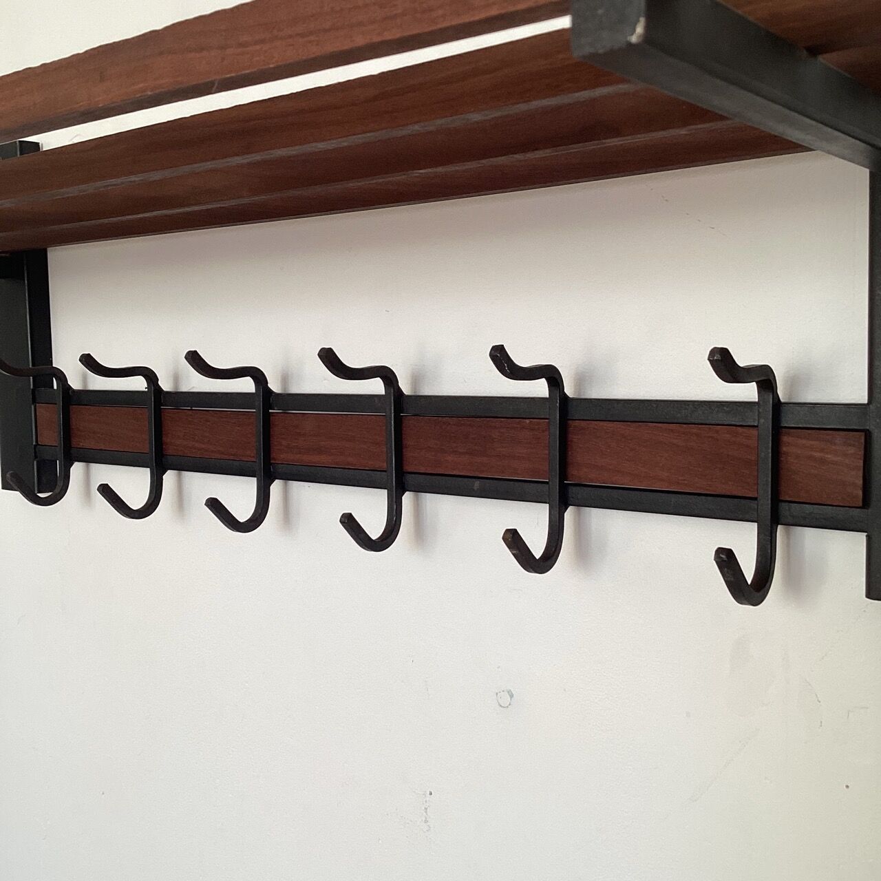 Wall-mounted coat rack