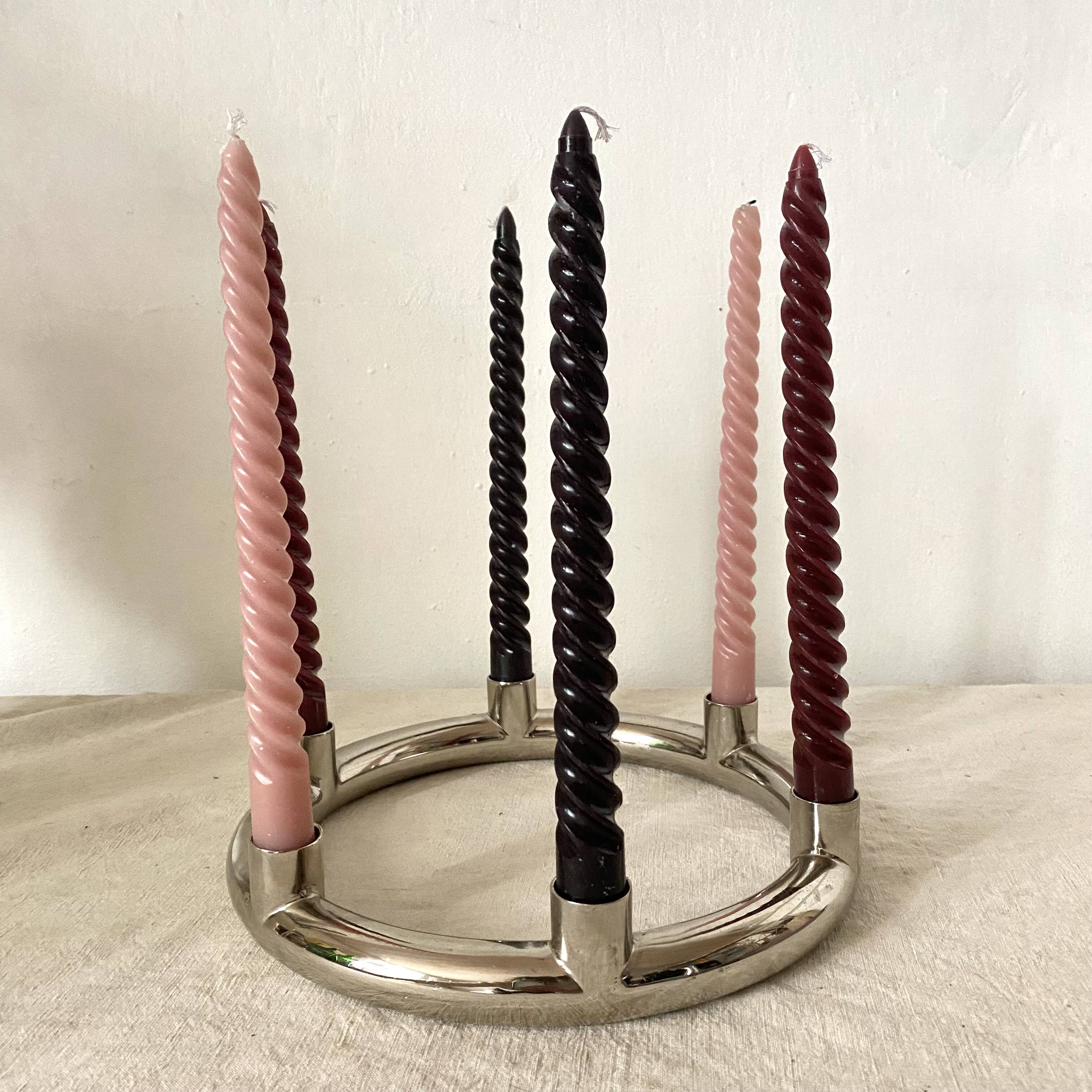 Tubular chrome candle holder