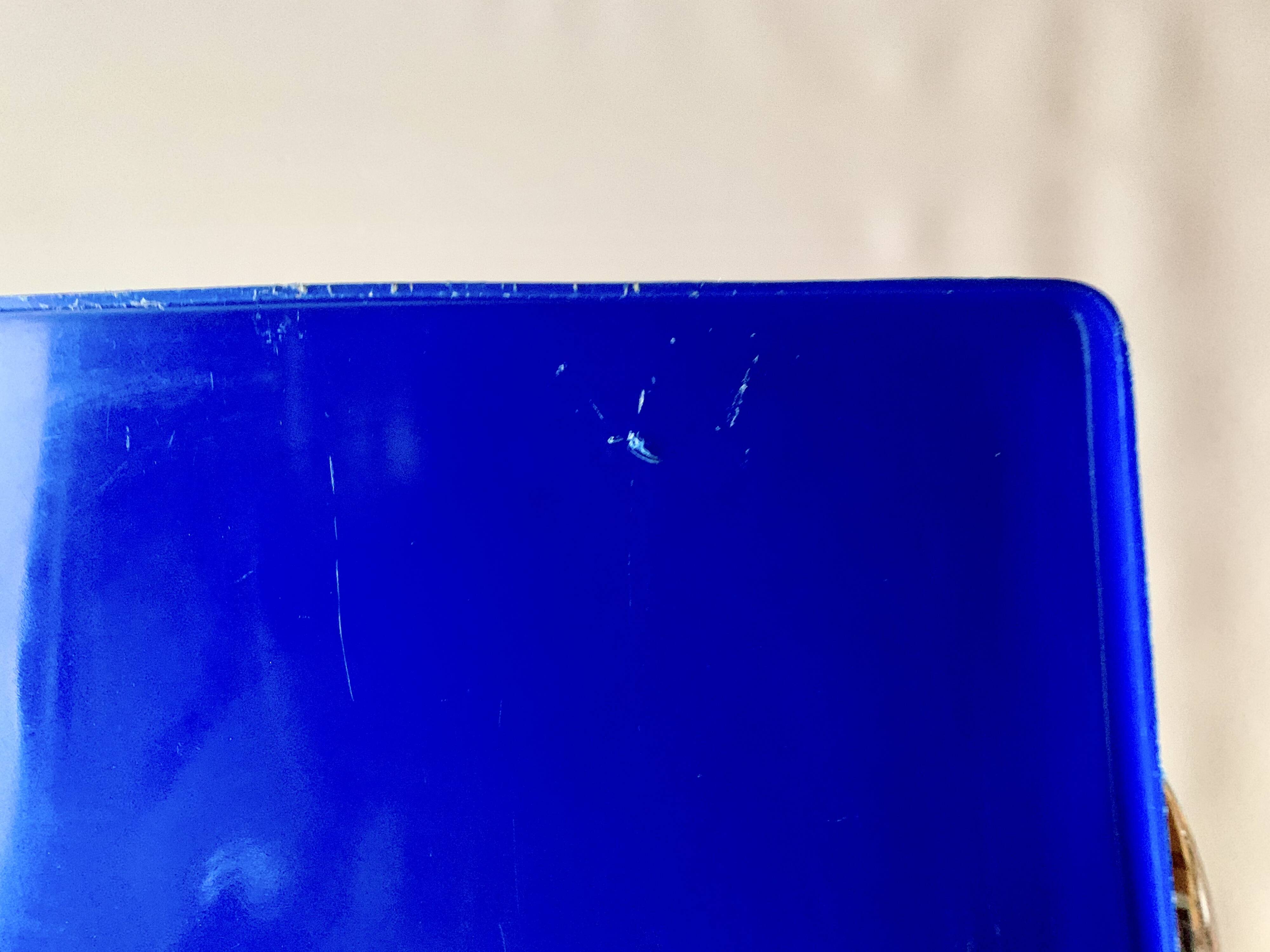 Vintage high chair for children in chrome metal and blue plastic