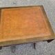 Small drop-leaf side table in English style with leather top & drawer.