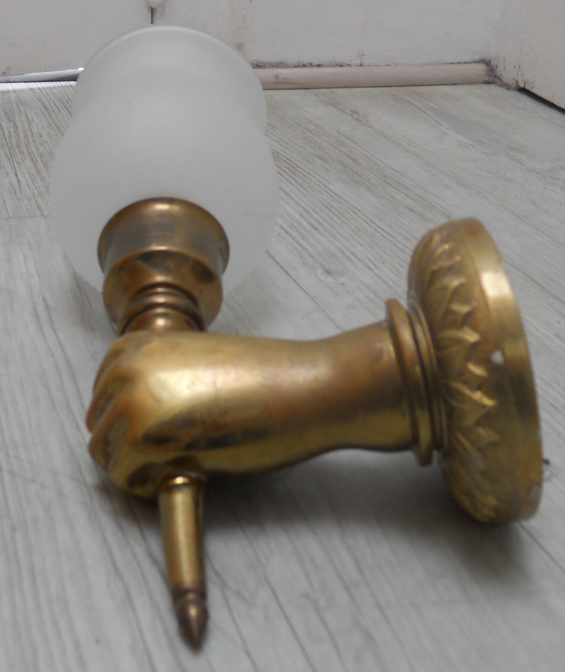 Pair of golden bronze flambeau sconces