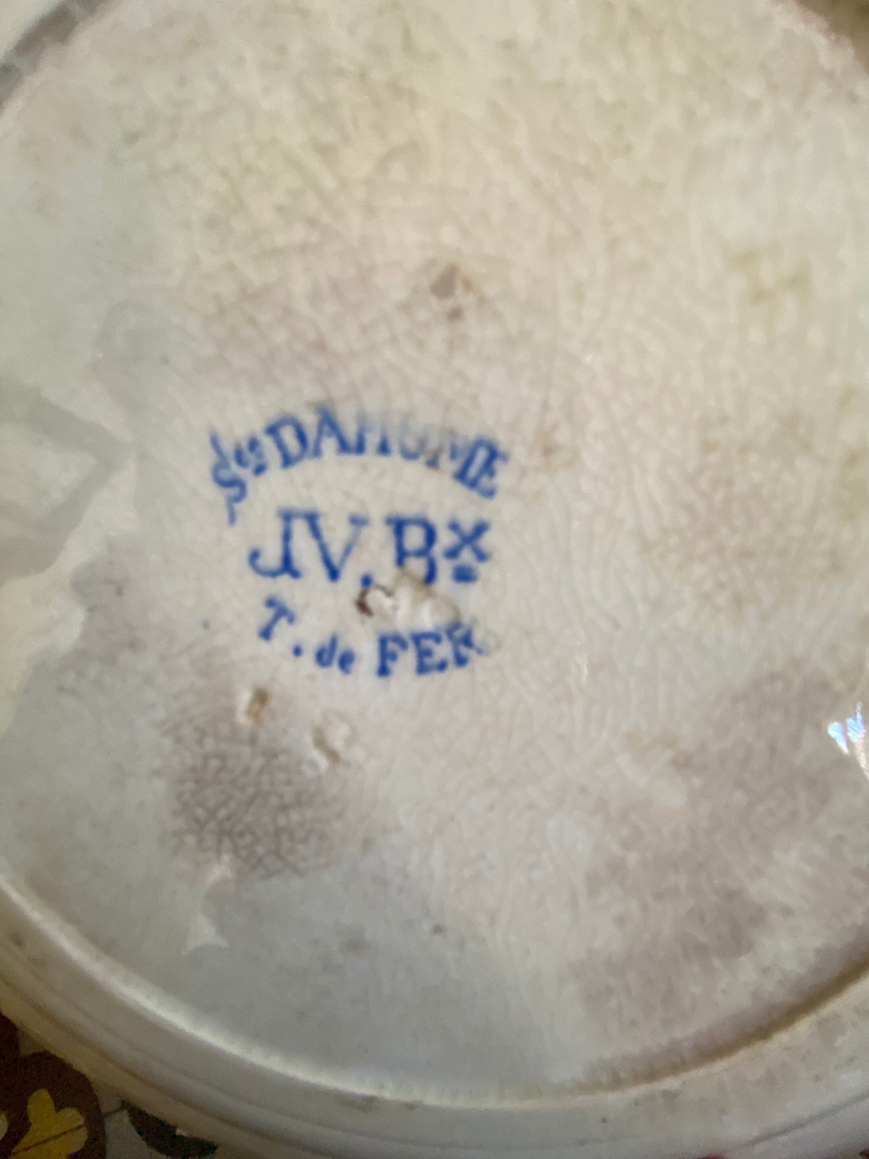 7 matching dessert plates in red green and blue.