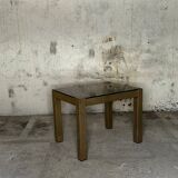 Trio of nesting tables, brass structures and smoked mirror tops