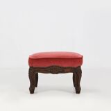 Baroque style foot stool in carved wood with coral velvet upholstery
