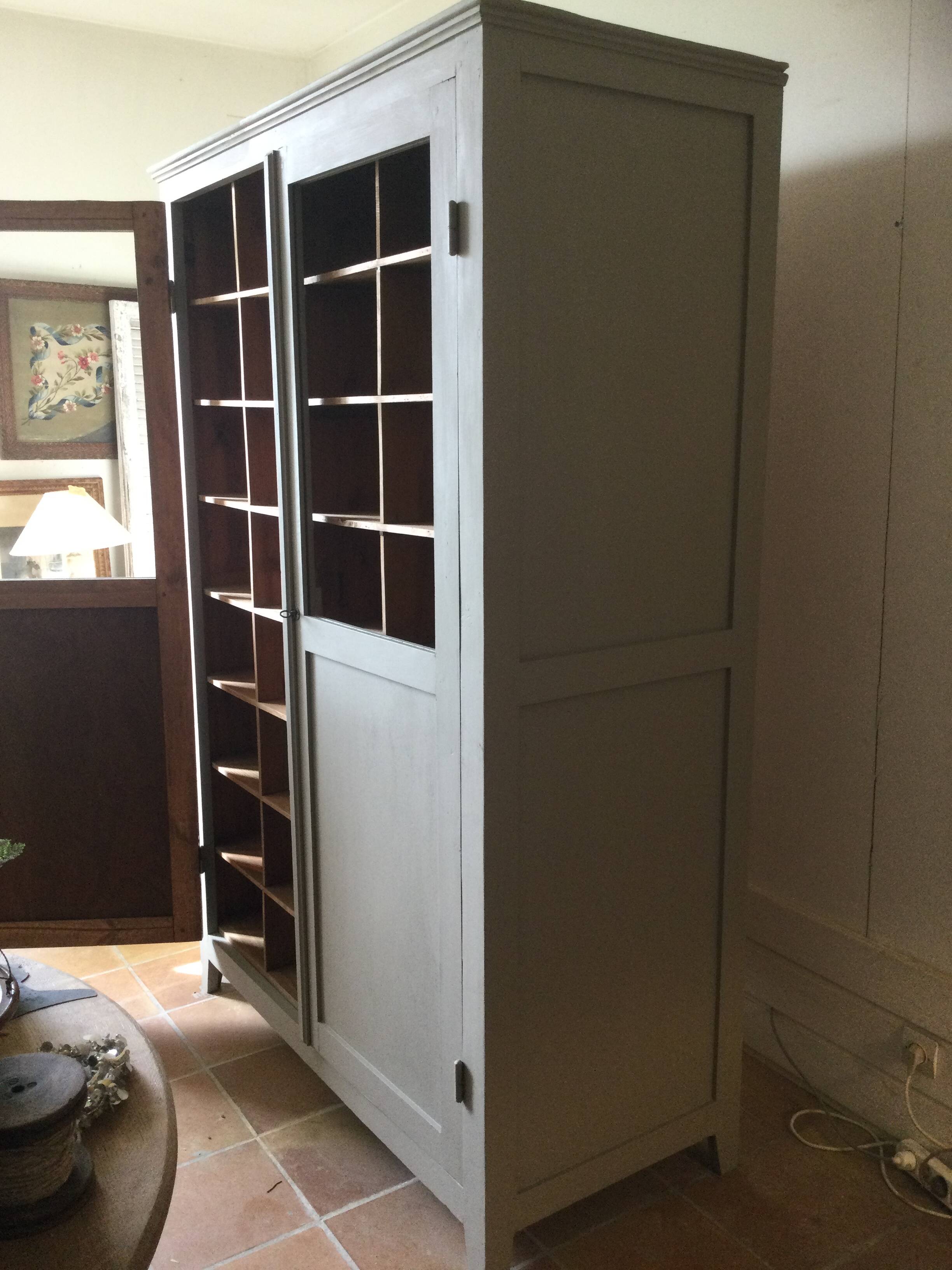Antique Parisian wardrobe with interior compartments.