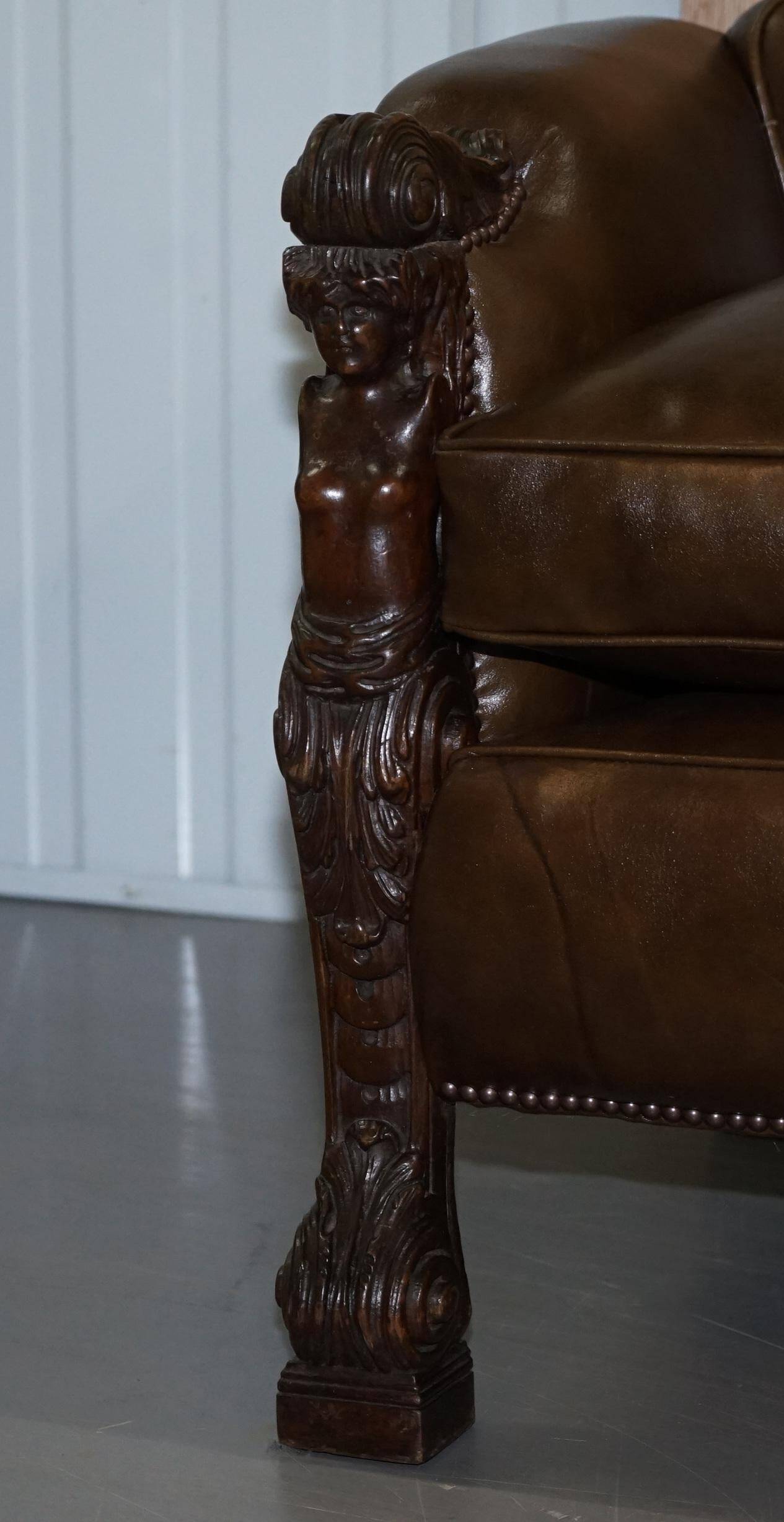 Restored Regency canapé in leather with sculpted Hermès frame.