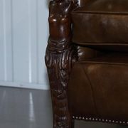Restored Regency canapé in leather with sculpted Hermès frame.