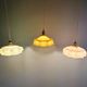 Trio of Art Deco pendant lights in colored opaline glass, 1930s