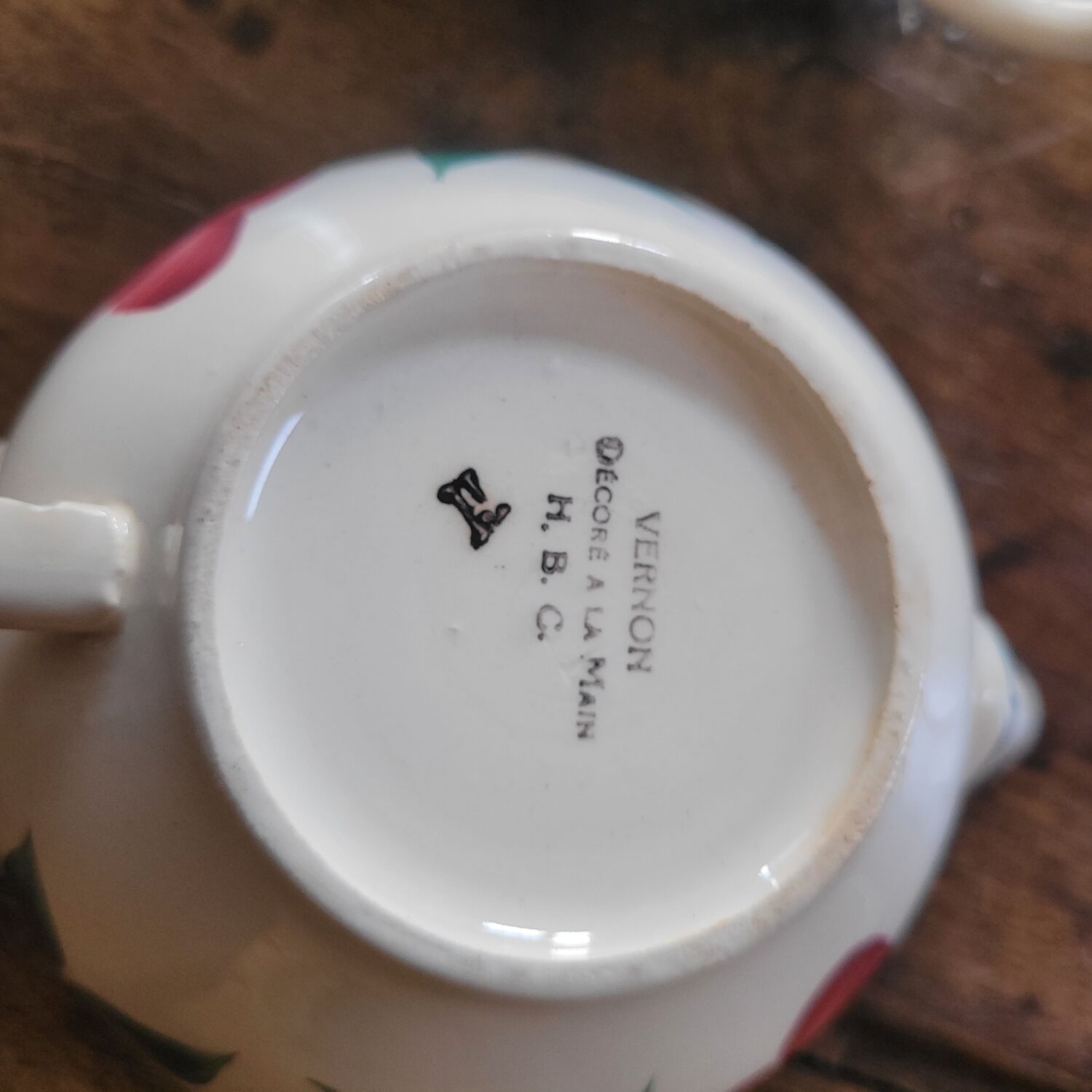 Pair of hand-painted floral-decorated jugs