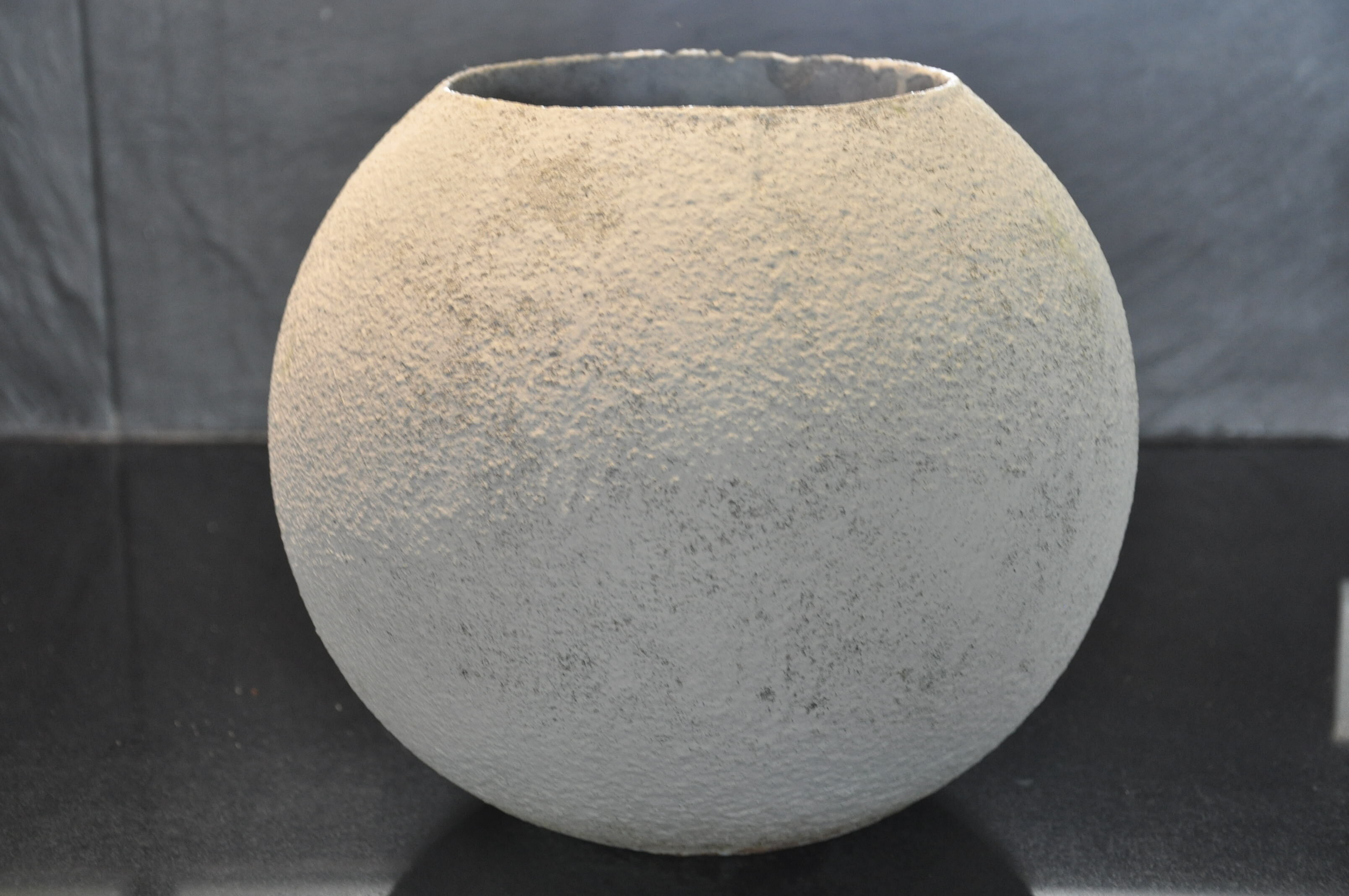 Cement ball planter from the 1960s