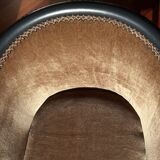 Pair of Art Deco barrel chairs in black and bronze