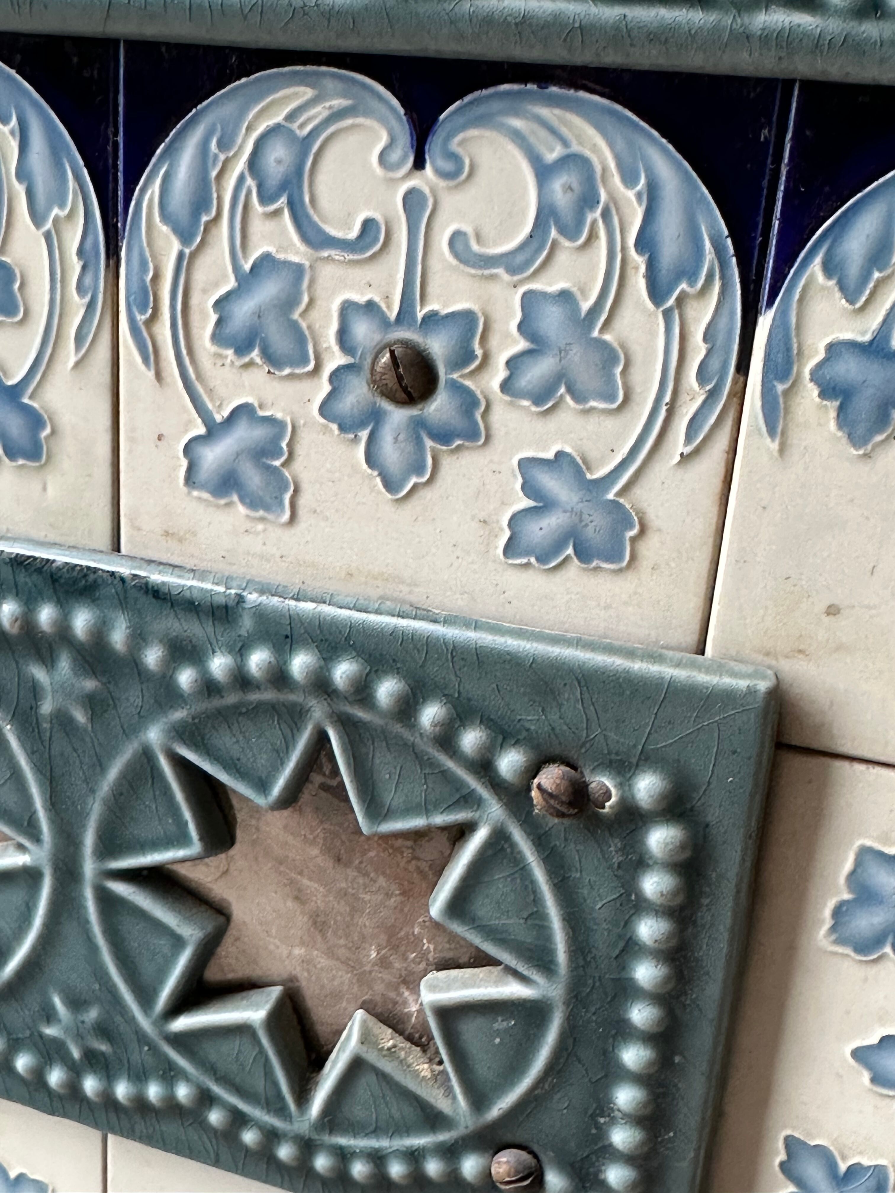Enamelled cast iron wood stove and earthenware Mirus