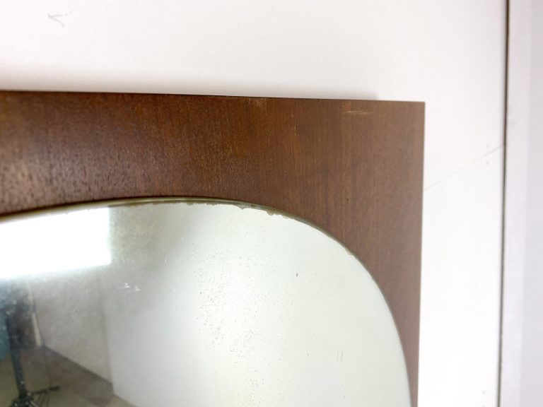 Retro mirror on wood