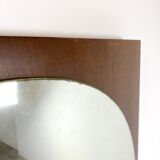 Retro mirror on wood