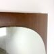 Retro mirror on wood