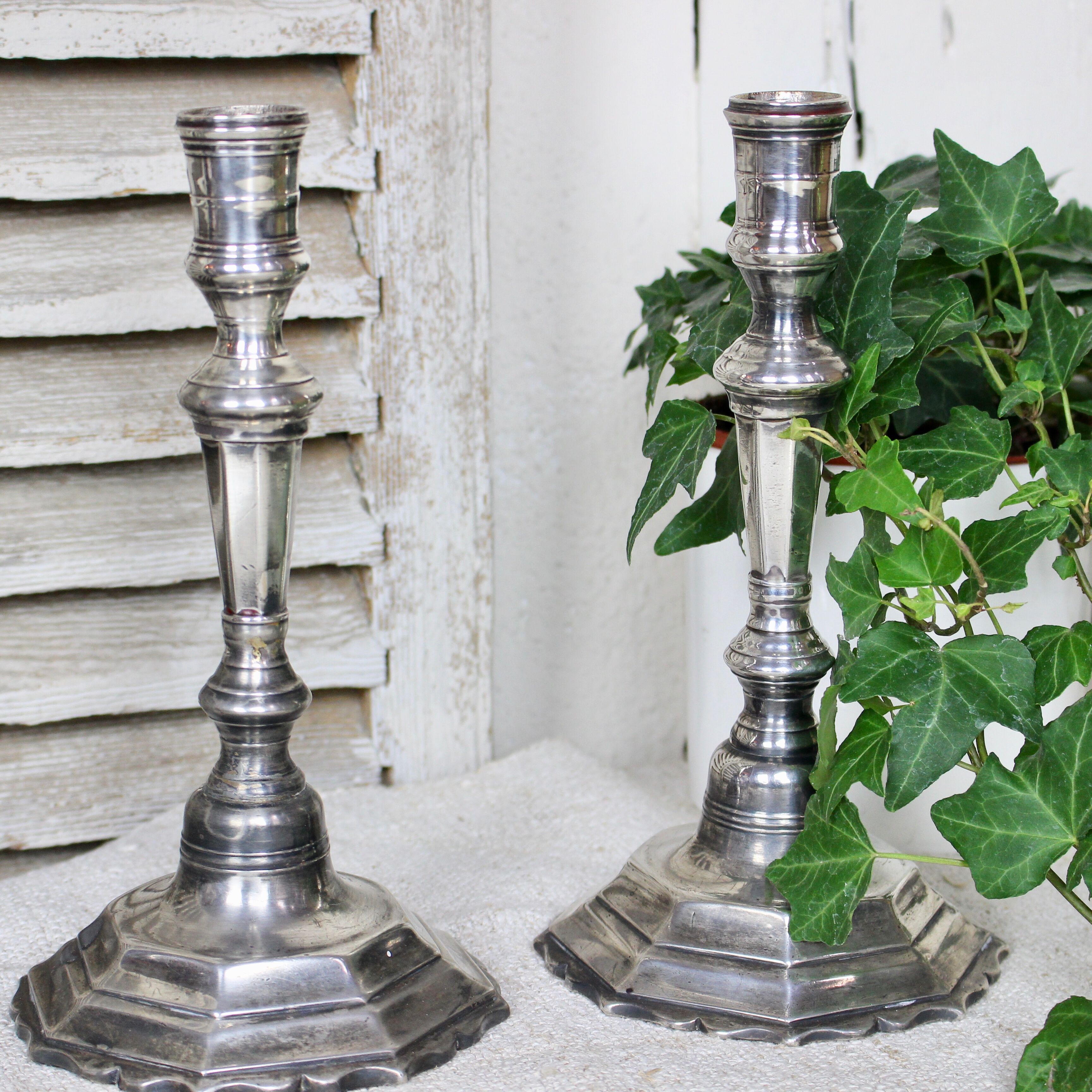 Pair of silver-plated bronze candlesticks