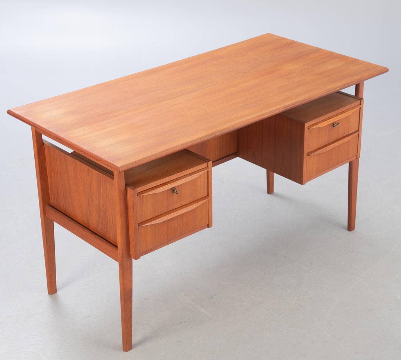 Scandinavian double-sided desk in teak by Gunnar Nielsen