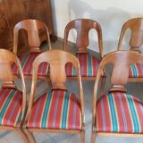 Gondola-style empire chairs