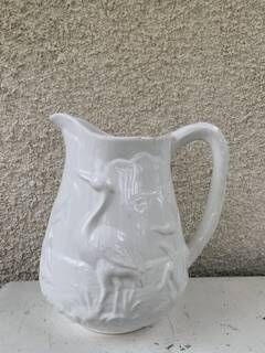 Carafe the heron in white glazed ceramic slipware.