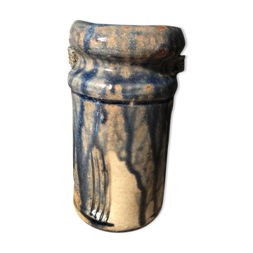Enamelled pottery vase signed