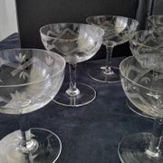 8 vintage champagne coupes with engraved decoration