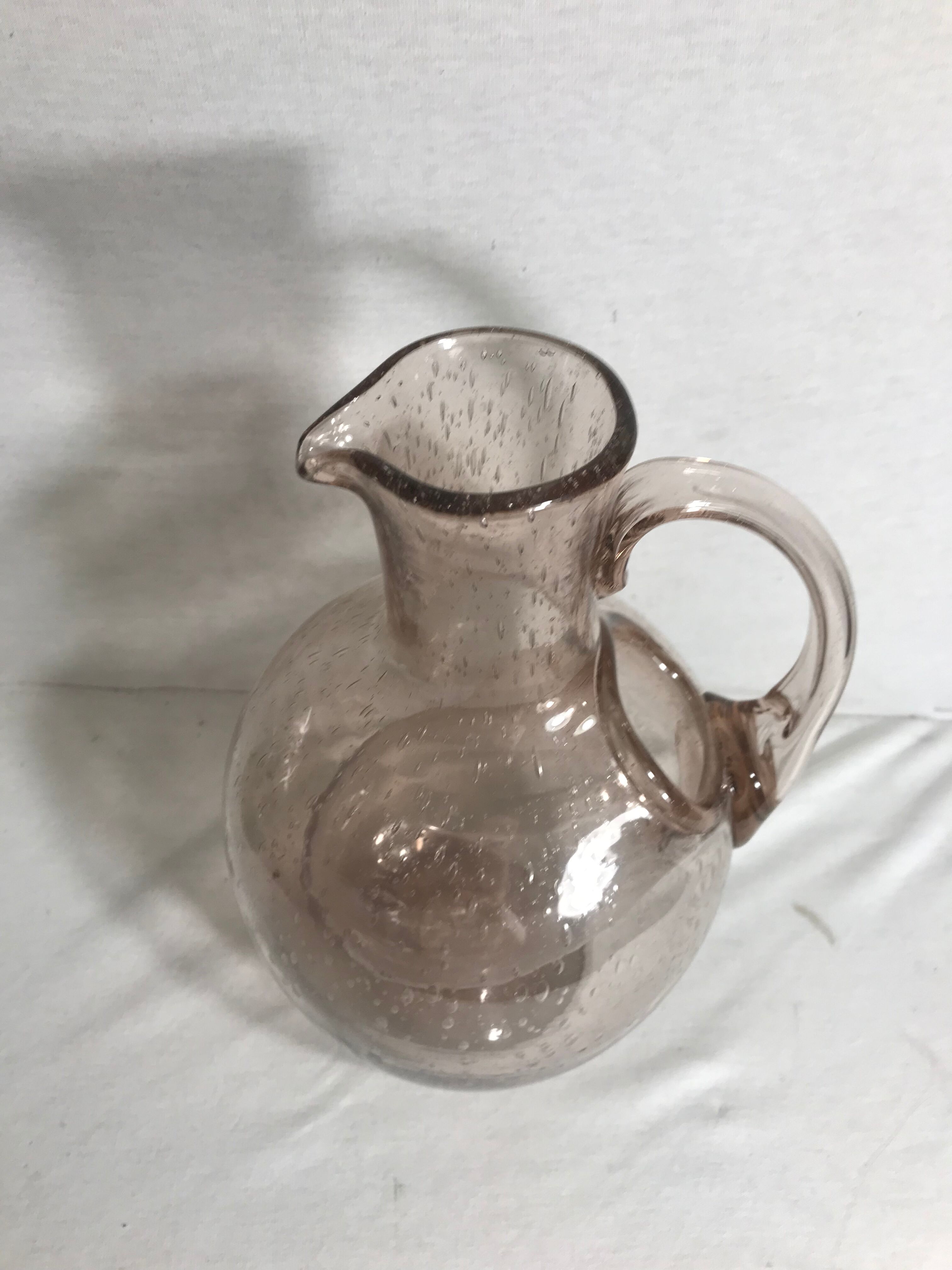 Bubble blown glass jug