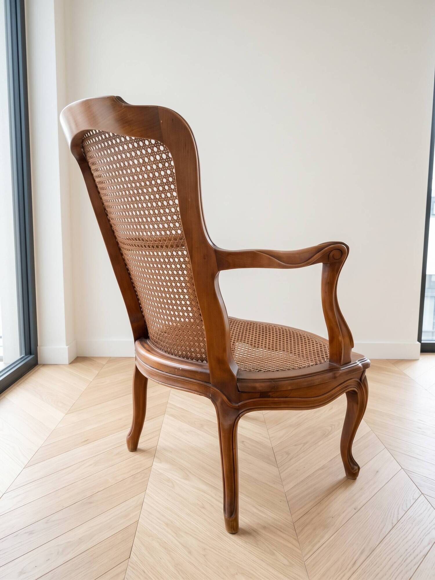 Low Louis XV armchair in wood and cane