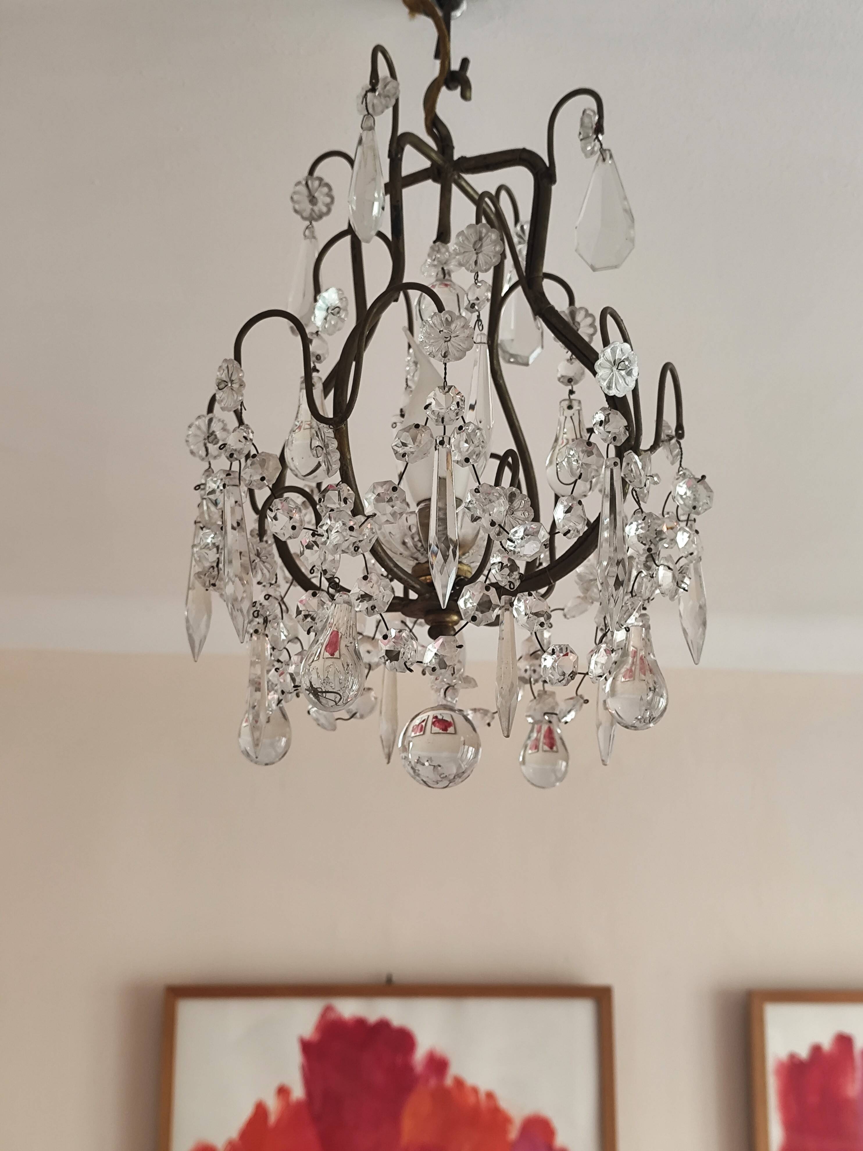 brass cage chandelier with crystal tassels