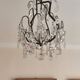 brass cage chandelier with crystal tassels