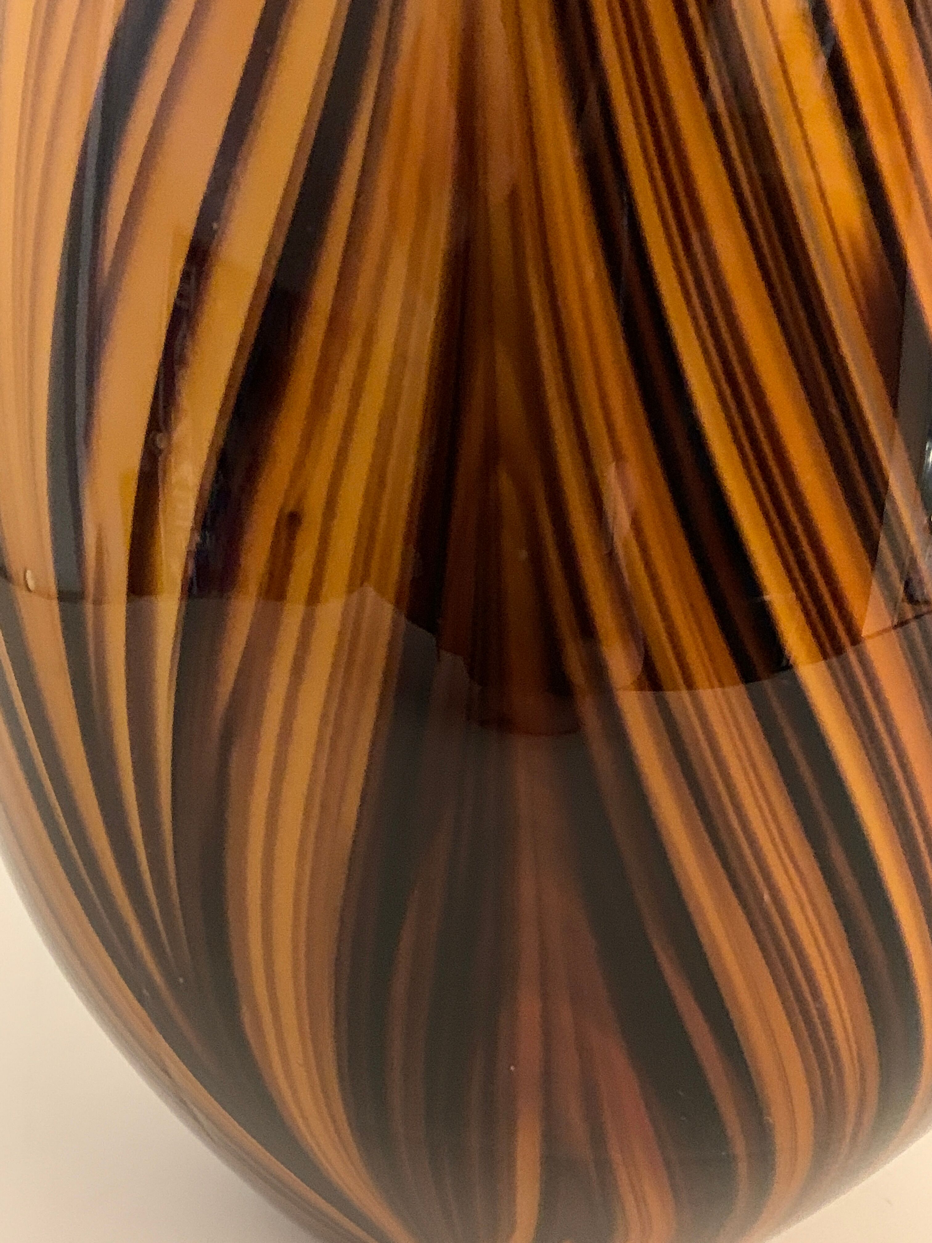 Yellow and black glass vase